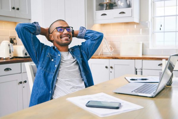 man proud of alternatives to savings accounts when asking what to do with extra money