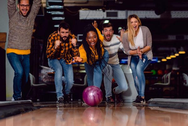 Friends relaxed and bowling Relax knowing that their money is growing