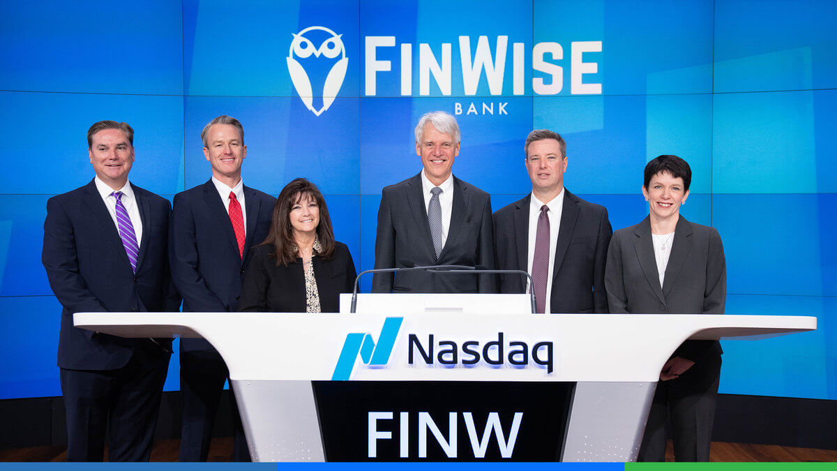 Sylvia at Nasdaq headquarters with the FinWise Bank Executive team.